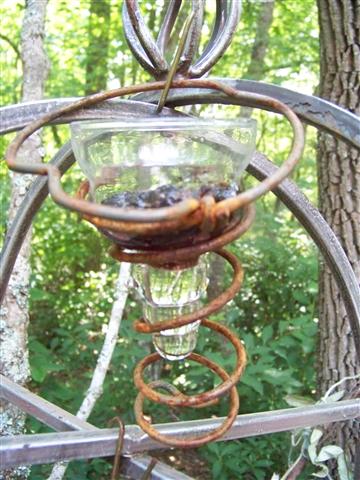 rusty bed spring coils repurposed upcycled, painted furniture, fill with jelly or fruit for the birds can use votive candle holders