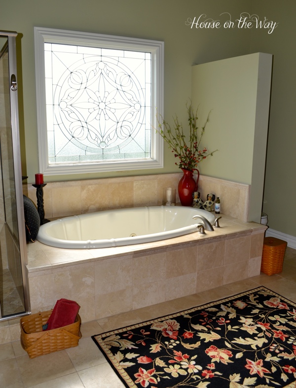 master bathroom tour, bathroom ideas, home decor, The large garden tub is highlighted by the decorative window