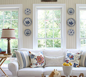 refreshed sunroom, home decor, changed the accent colors to blues reds and grays Collected accessories from antique malls ebay and Pottery Barn outlet