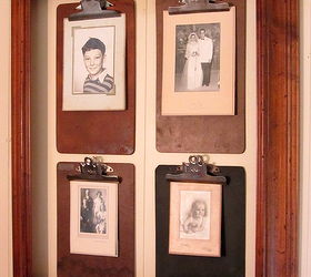 a framed clipboard photo wall, home decor, repurposing upcycling, Four old clipboards with black and white vintage photos in vintage folders hang inside a frame