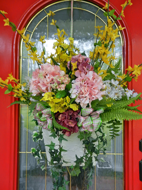 spring front door basket to summer inspired before and after, seasonal holiday d cor, wreaths, Spring Inspired Floral Basket on a red painted door Before