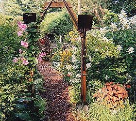 rusty tool arbor, gardening, An inexpensive and unique arbor we built using old garden tools http ourfairfieldhomeandgarden com
