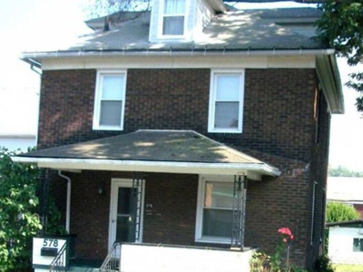 q what color, curb appeal, painting, This is the front of the house The brick really is red the shadows from the trees are making it look brown Notice the two windows on the second floor