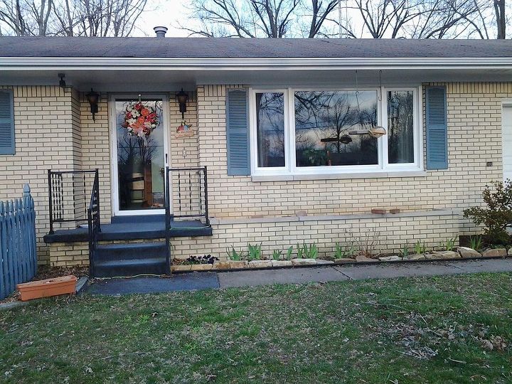 color for exterior, curb appeal, painting, ranch house two car attatched garage on right of window On left of door outside unit for a c and then 2 bedrooms side by side