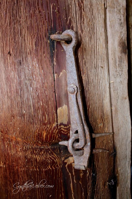 salvaging treasures to save them from demolition, repurposing upcycling, This rustic ironwork latch caught Kents eye and made its way home with us Still attached to the door it had been married to for who knows how many years We couldn t bear to seperate them from their wedded bliss