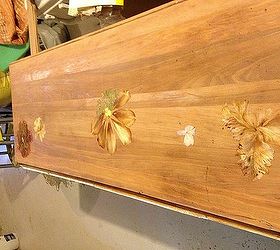 decoupaging pressed flowers on furniture, the total surface of the buffet Pressed flowers are ready to be glued