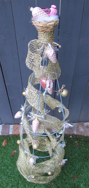 re purposing a tomato cage into a christmas tree, christmas decorations, repurposing upcycling, seasonal holiday decor, Tree decorated This one stands 54 tall but smaller cages are available