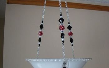 Re-purposed Bling vintage ceiling light fixtures to make candle holders