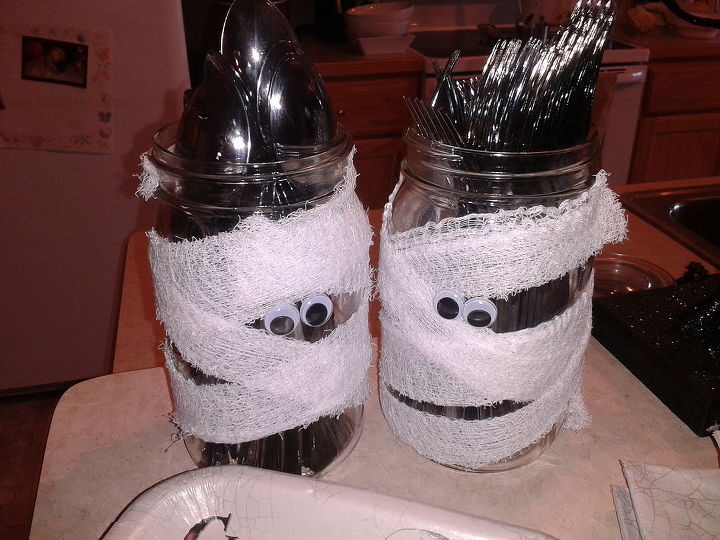halloween decorations, crafts, curb appeal, halloween decorations, seasonal holiday decor, Mummy candles and or silverware holders