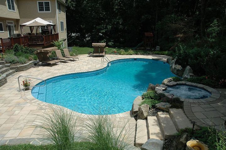 pool patio too hot concrete paver slabs look like stone with low heat, Freeform vinyl liner pool with steps up to the spa patio