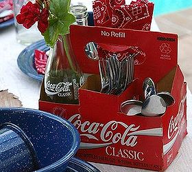 patriotic table decor it s all bottled up, outdoor living, patriotic decor ideas, repurposing upcycling, seasonal holiday decor, a cardboard soda bottle carrier becomes a tabletop caddy for flatware napkins condiments or more flowers