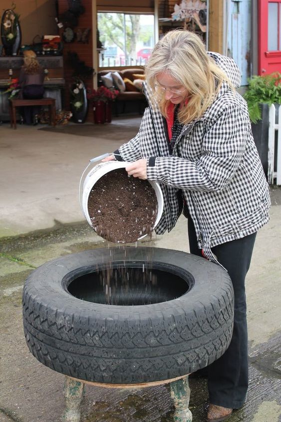 up cycled tire planter, container gardening, flowers, gardening, perennials, repurposing upcycling, Step 4 Add soil Choose a container mix suitable for Bedding Plants Ensure that you fill the tire completely