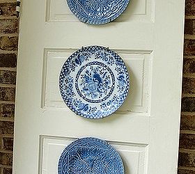 thrift store door plate display, outdoor living, porches, repurposing upcycling, The plates were not being used They used to be in my daughter s room