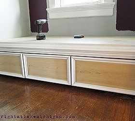 our window seat family library, diy, home decor, how to, storage ideas, The drawers are on casters for easy access and we added picture rail trim to give them a more built in look We also added chair rail to the front of the seat for the same reason