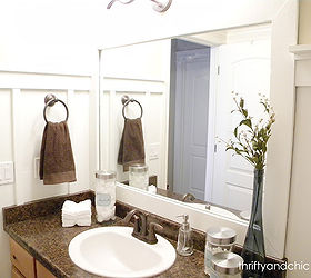 60 bathroom makeover, bathroom ideas, home decor, Updated the decor the frame around the mirror and added board and batten