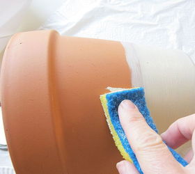 how to easily age terra cotta pots, crafts, gardening, Take a sponge and apply the paint mixture onto the terra cotta pot leaving certain areas of the pot lightly exposed