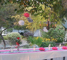 zebra and pink courtyard table scape for sweet 16 party, home decor, outdoor living, I also hung a chandelier that I repurposed a few years ago and added solar lights to it