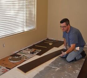 living room remodel installing hardwood day 1, diy, flooring, hardwood floors, living room ideas, Laying the planks