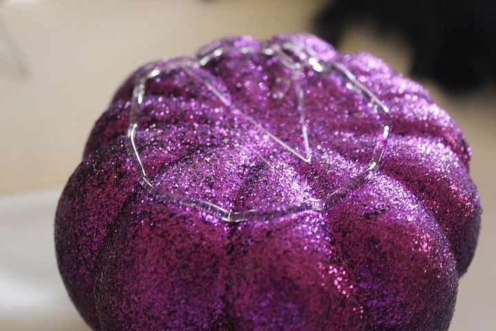 how to make topsy turvy glam pumpkins, crafts, seasonal holiday decor, Hot glue the bottom pumpkin and stick boa to it