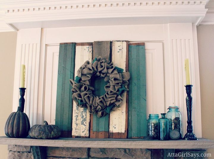 rustic fall mantel with reclaimed chippy wood and blue ball jars, fireplaces mantels, home decor, wreaths, Fall mantel featuring aburlap wreath on chippy blue and cream vintage salvaged wainscoting pumpkins and vintage blue Ball jars