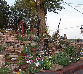 my rock gardens, flowers, landscape, outdoor living, ponds water features, Stone path ponds birdhouse bird feeder and more
