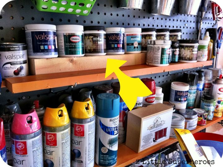 garage paint storage, cleaning tips, garages, shelving ideas, storage ideas, Added a scrap piece of wood so that the back row of paint samples can be seen