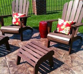 creating a gorgeous outdoor space, decks, outdoor living, Adirondack chairs with floral pillows and outdoor garden seat used as an end table