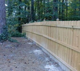 fenced in a 5 acre yard, Left inside side of fence Picture is taken to show length of fence running to back of property