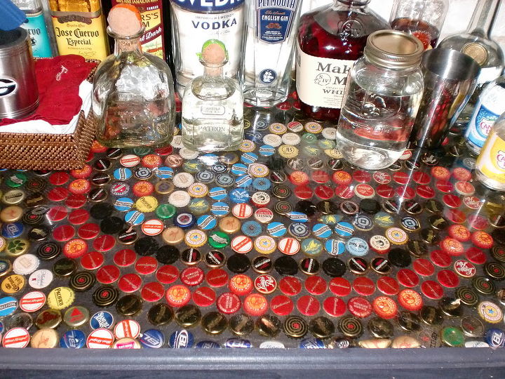 built a dry bar in my game room, Poured laqcuer over bottle caps to give the bar top a nice finish