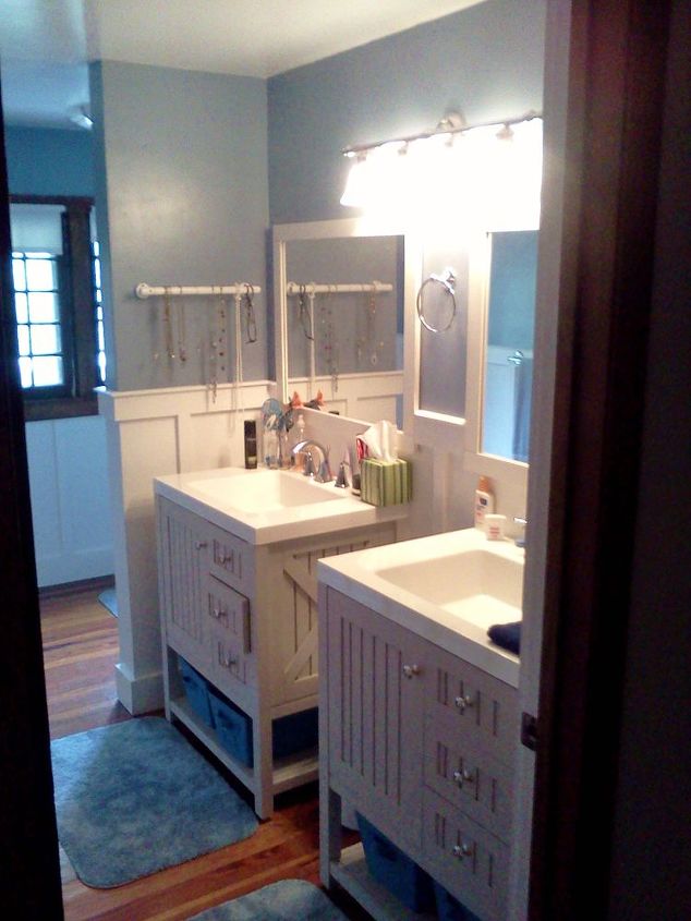 our florida bungalow bathroom redo, bathroom ideas, home decor, woodworking projects, Some fake board and battan walls new paint new vanities and we got a whole new look