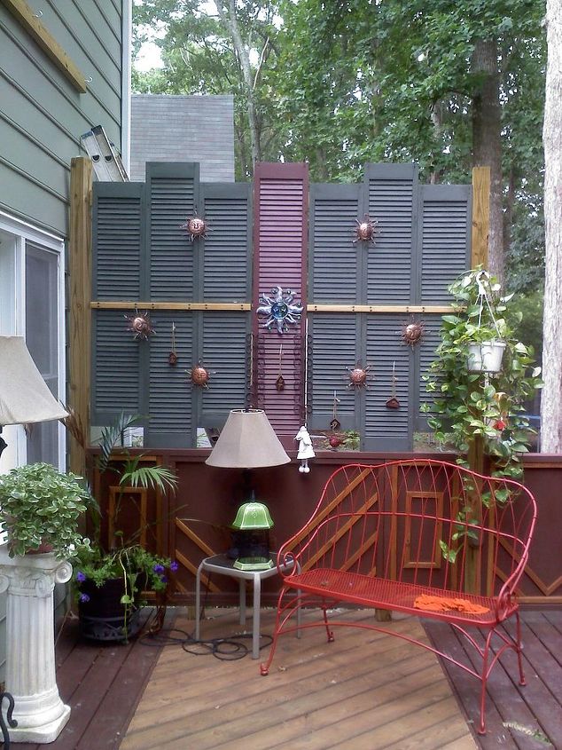 privacy on the deck, decks, outdoor living, repurposing upcycling, Old shutters at a garage sale for 2 makes a great screen on the deck