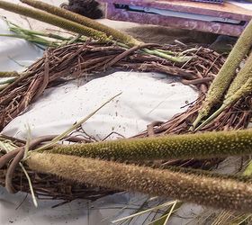 grass seed head wreath, crafts, gardening, seasonal holiday decor, wreaths, I began to work my way around the wreath weaving the grass stems into the wreath this really couldn t be easier just place them like you like