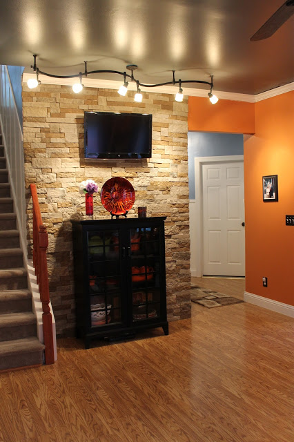 living room reveal, home decor, living room ideas, Installed a DIY stone accent wall using Lowe s AirStone product in Mountain Autumn
