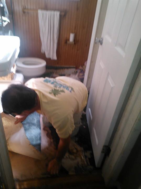 redoing bathroom floor and walls, bathroom ideas, remodeling, My boyfriend ripping up the old flooring