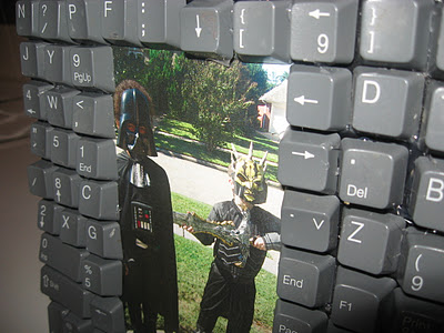 computer keyboard frame, crafts, repurposing upcycling, We used it to display some little guys Halloween pics