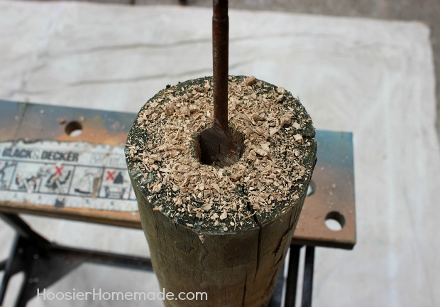 diy wooden firecrackers and our summer front porch, crafts, outdoor living, patriotic decor ideas, seasonal holiday decor, Drilling a hole for the wick