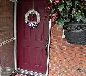 red white blue front porch updates, patriotic decor ideas, porches, seasonal holiday decor, wreaths, A patriotic wreath for summer