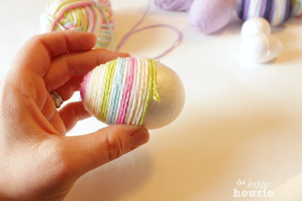 cute and quick yarn wrapped easter eggs, crafts, easter decorations, seasonal holiday decor