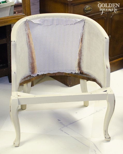 reupholstered tufted cane chair tutorial part 2, diy, how to, painted furniture, Getting the back in is one of the hardest parts but this tutorial shows you how to staple it in without ruining the caning