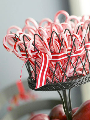 5 last minute holiday decorations you can do before your guests arrive, christmas decorations, crafts, seasonal holiday decor, Simple Stripes Stuff iconic candy canes into a decorative bowl or flowerpot and add red and white stripe ribbon for a coordinating touch