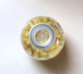 shaker bottle fruit fly trap, pest control, repurposing upcycling, The little holes in the shaker bottle cap are perfect for attracting the fruit flies and trapping them inside the bottle
