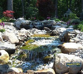 large pondless waterfall with strong water rushing through a split stream and over, curb appeal, outdoor living, ponds water features, Added 10 16 12 The yard on this home is finally completed with the main focal point being created by Liquid Designz and the Legends of Rock team