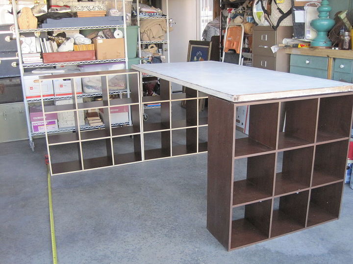 my creative space where this blogger creates, craft rooms, storage ideas, table under construction 4 sets of bookcases are used as the base the table is 6 x 6 5 feet