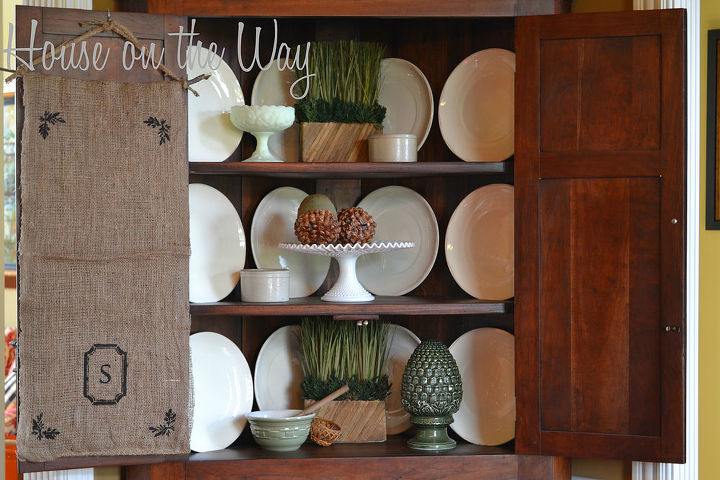 fall decor in its simplicity, seasonal holiday decor, Corner cabinet filled with simple white dishes and touches of green