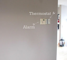 how to cover up a wall thermostat or home alarm, home decor, wall decor, Our thermostat and alarm box were placed in an awkward spot on the wall and made it difficult to hang anything around them