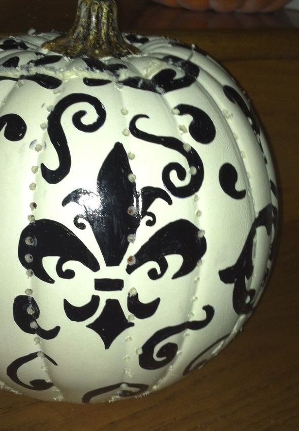 painted white faux pumpkin, crafts, seasonal holiday decor, I had planned on only have a single stencil but it looked too empty so I went a little crazy with stencils and some free hand designs
