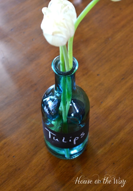 chalkboard labeled glass bottles, chalkboard paint, crafts, Chalkboard labeled glass bottle can be used as a vase or for a multitude of purposes