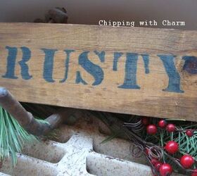 quirky rusty antler winter centerpiece, seasonal holiday decor, Couldn t resist this old cow sign