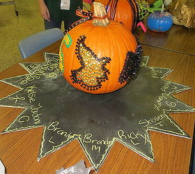 decorate a pumpkin for halloween with thumbtacks, chalk paint, chalkboard paint, crafts, halloween decorations, seasonal holiday decor, The witch was created with an outline of black thumbtacks and filled in with gold brads