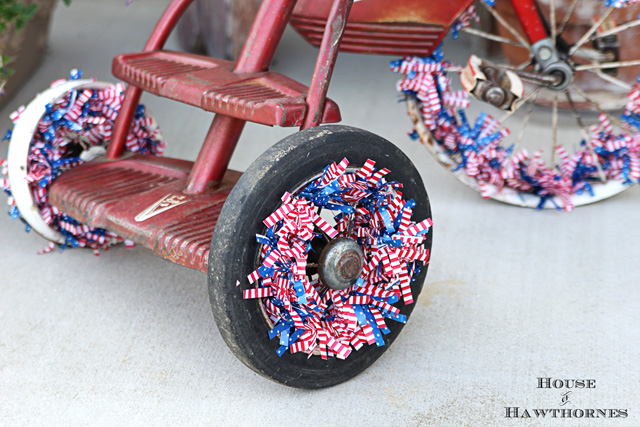 are you decorating your bike for the fourth of july, christmas decorations, flowers, gardening, patriotic decor ideas, repurposing upcycling, seasonal holiday d cor, Yes there is only one wheel that still has a tire on it It just means she has been ridden a lot and well loved nothing wrong with that